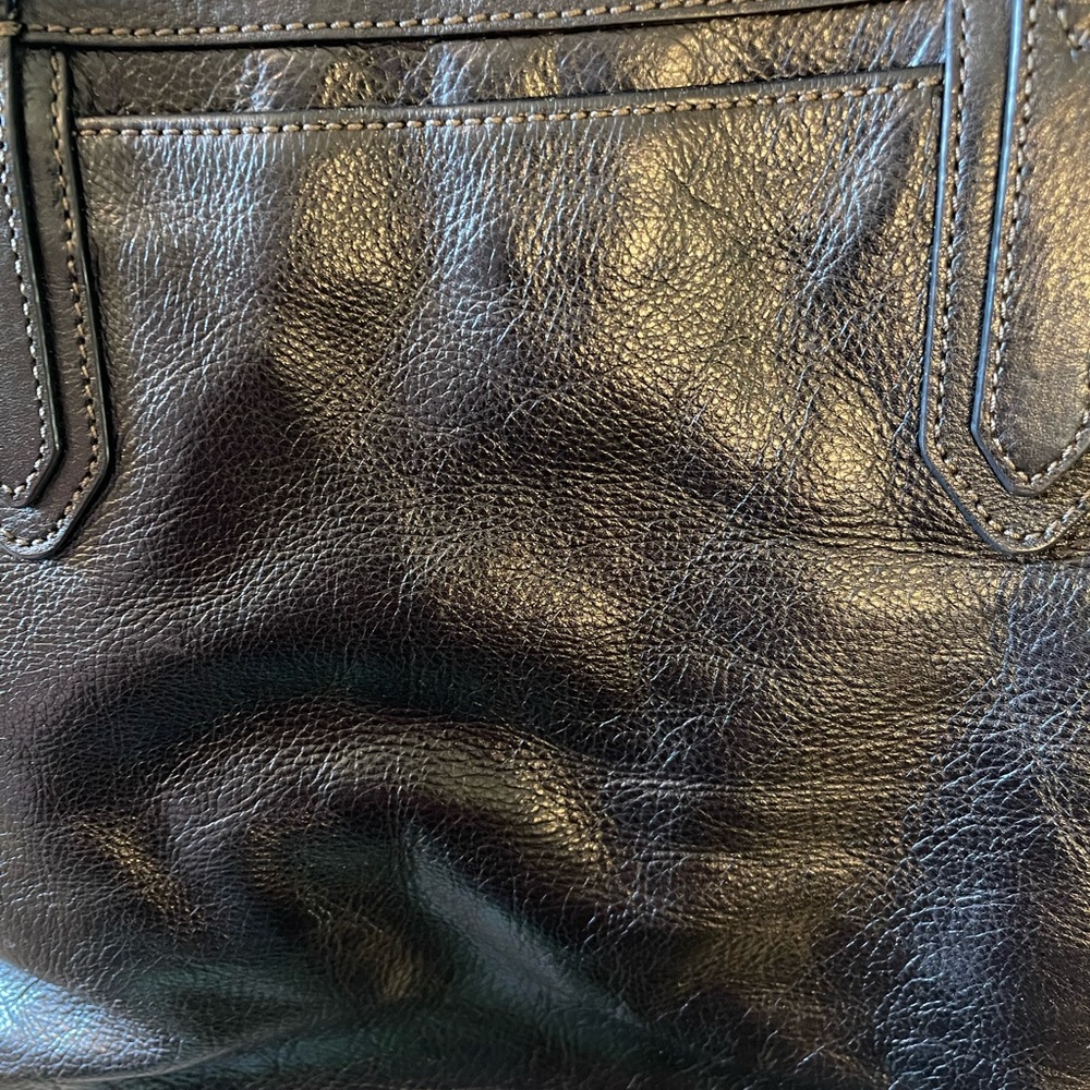 Fossil Sydney Tote in black. Frayed handles, no corner wear. Smooshy leather